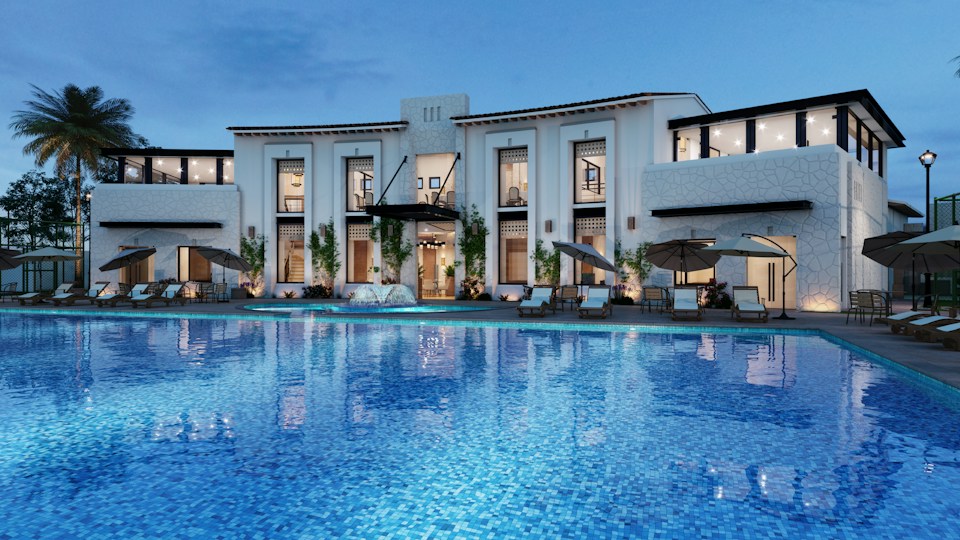 Hotel con piscina al atardecer